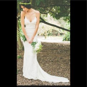 White spaghetti strapped wedding gown